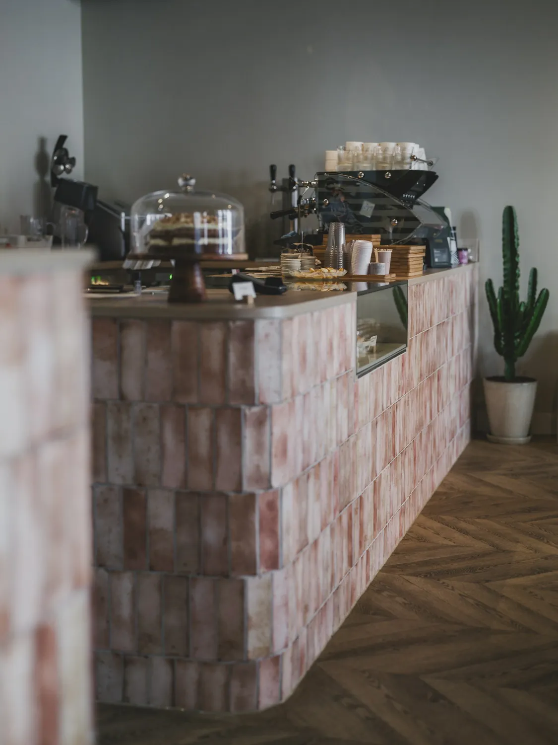 The tiled counter and pastry case