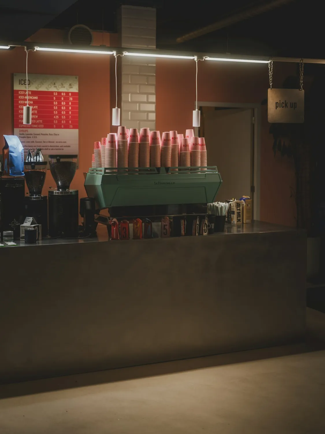 Cups lined up on the bar